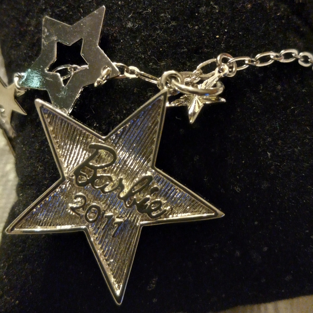 Barbie silver tone star charm bracelet.